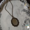 Кулон Дзеркало 18*25 Квіти. колір бронза. На ланцюжку